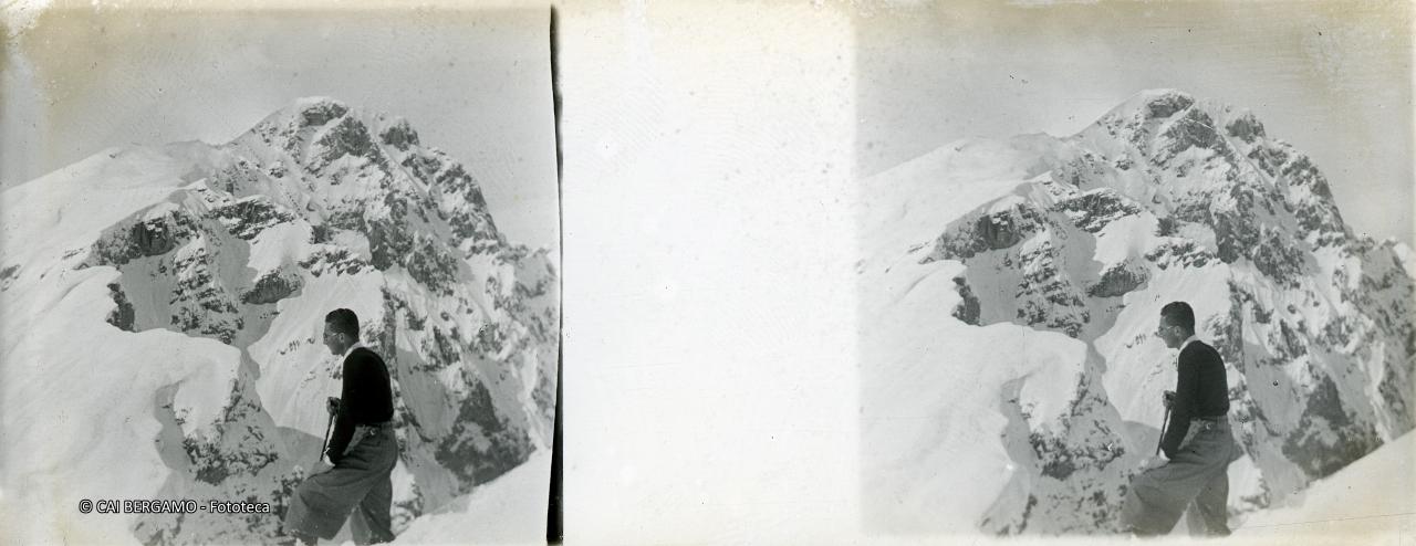 Scialpinista sotto lo sguardo vigile del ….