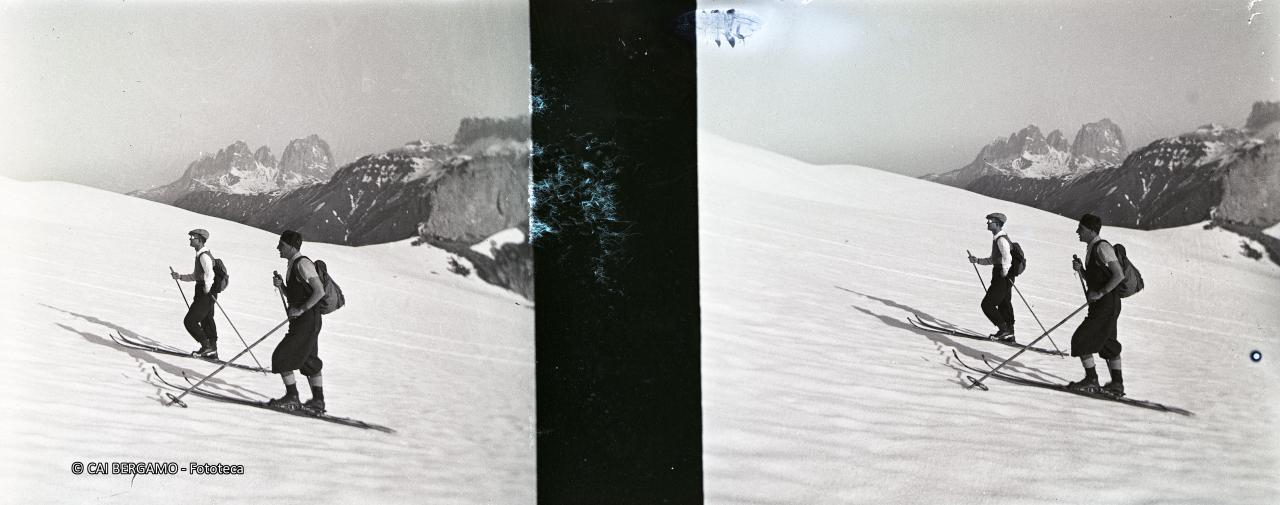 Piano piano si sale con gli sci e sullo sfondo il Sassolungo