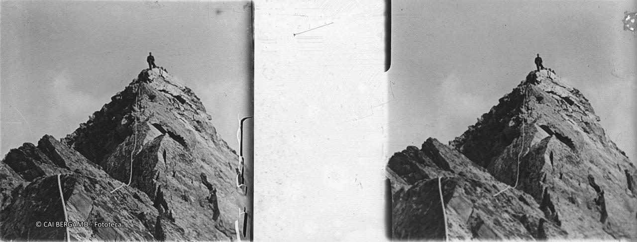 In vetta con corda lungo la cresta